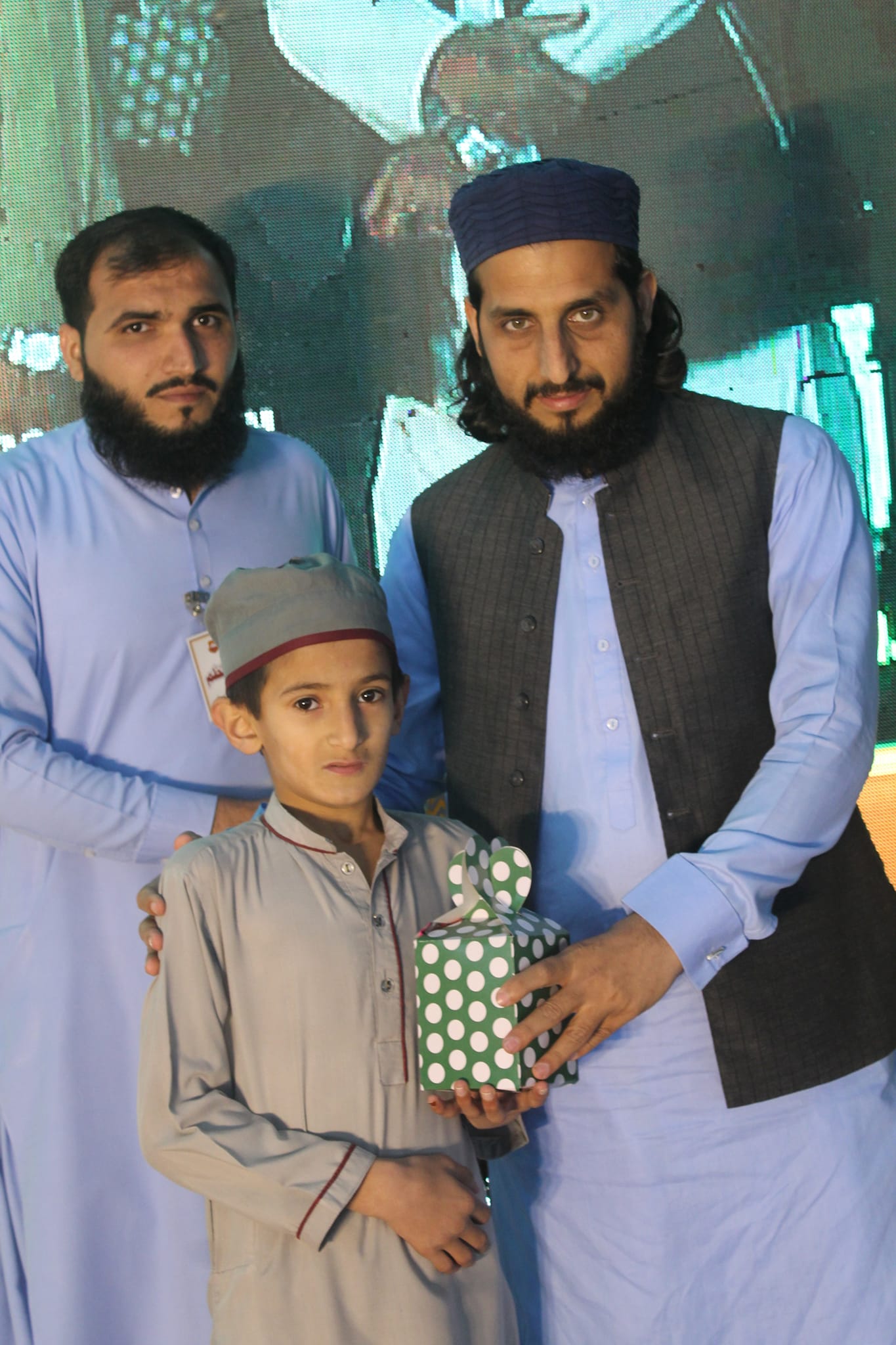 Dog sitting in a yellow kayak
